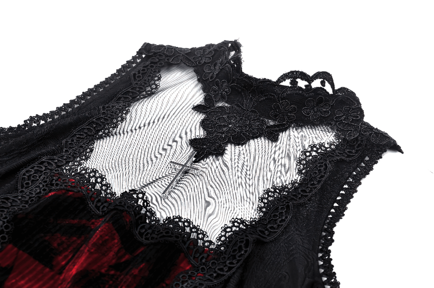 Close-up of vintage cold shoulder dress showcasing intricate black lace details and burgundy accents.