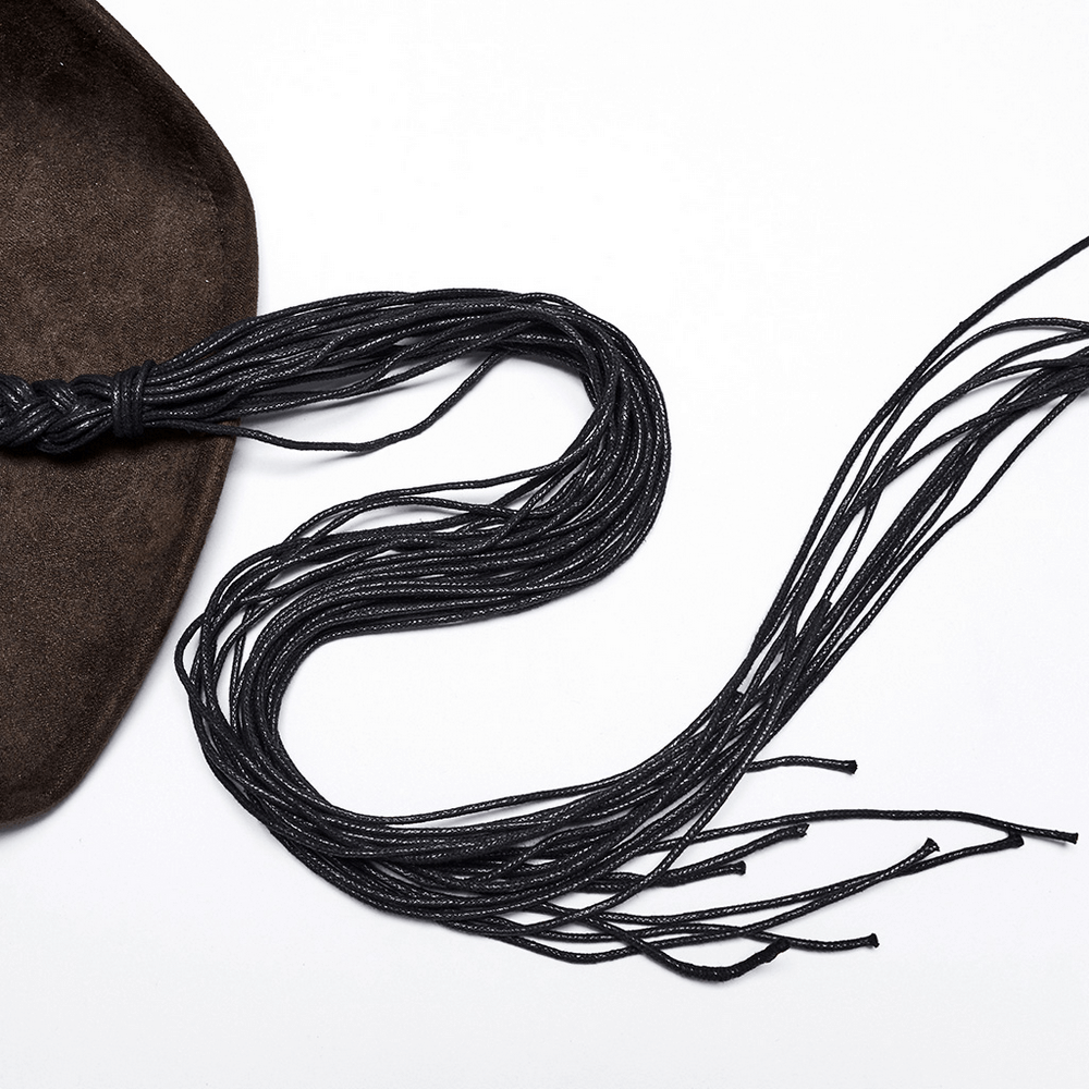 Vintage dark cowboy hat with black fringe details and bold gothic style on a white background.