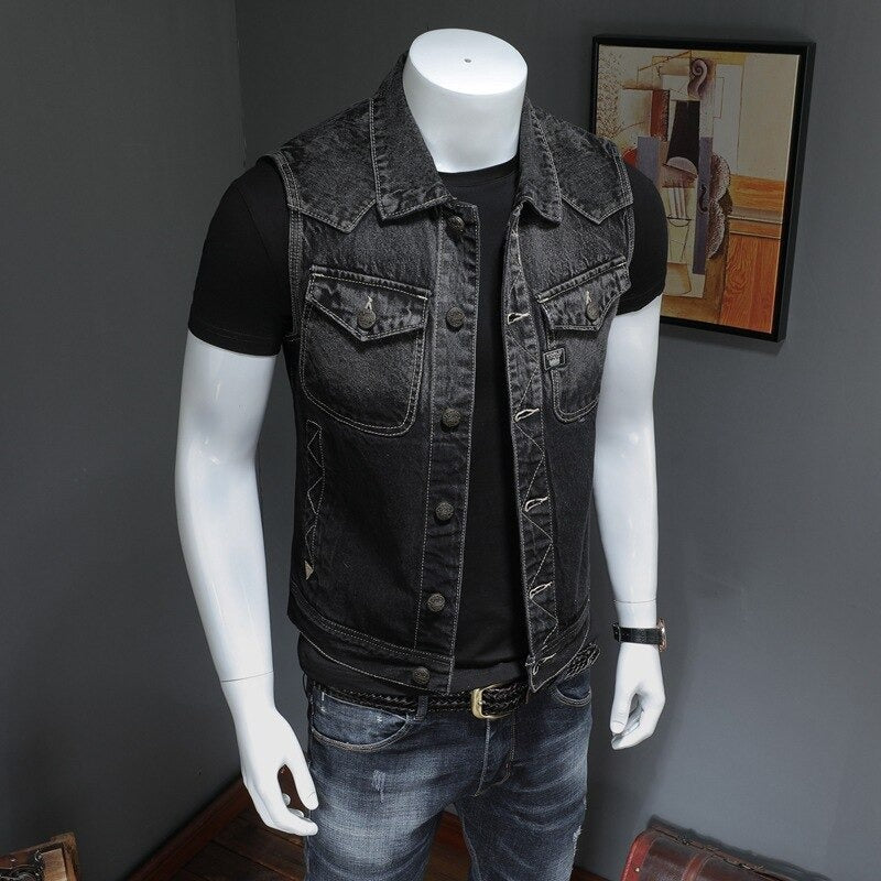 Men's vintage denim vest displayed on a mannequin, showcasing its sleeveless biker style with pockets and a stand-up collar.