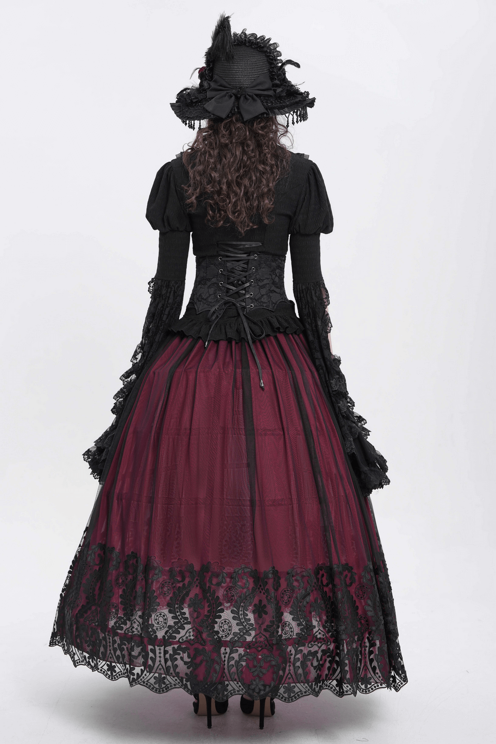 Elegant vintage gothic outfit featuring a wine red mesh maxi skirt with intricate black embroidery and a matching hat.