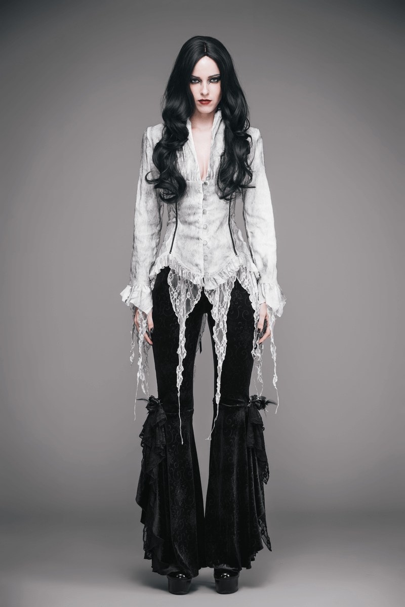 Elegant white deep V blouse with lace inserts, gothic style, paired with black flared pants, showcasing vintage fashion.