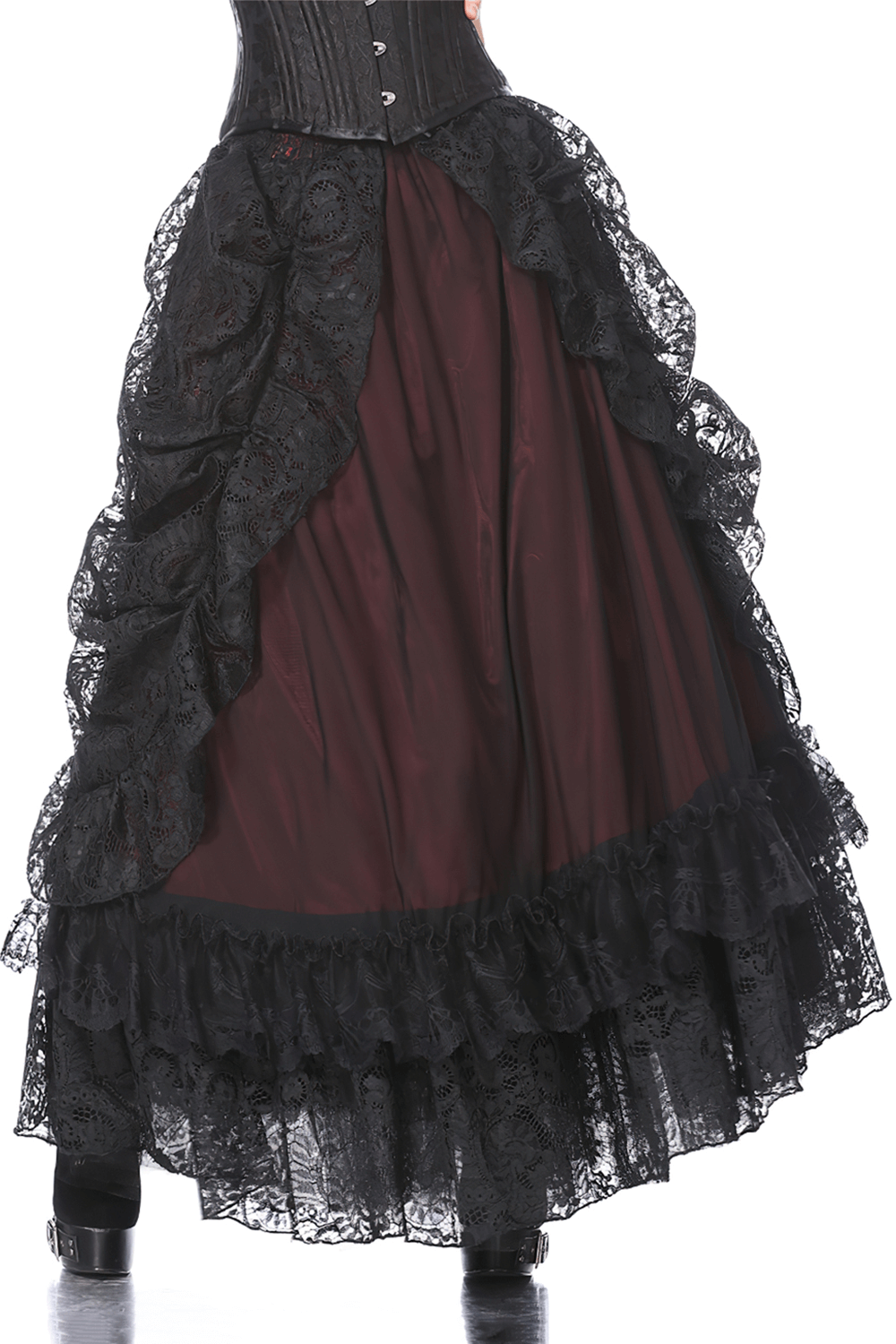 Vintage black lace maxi skirt with ruffles, featuring a dramatic bustle back and elegant detailing.