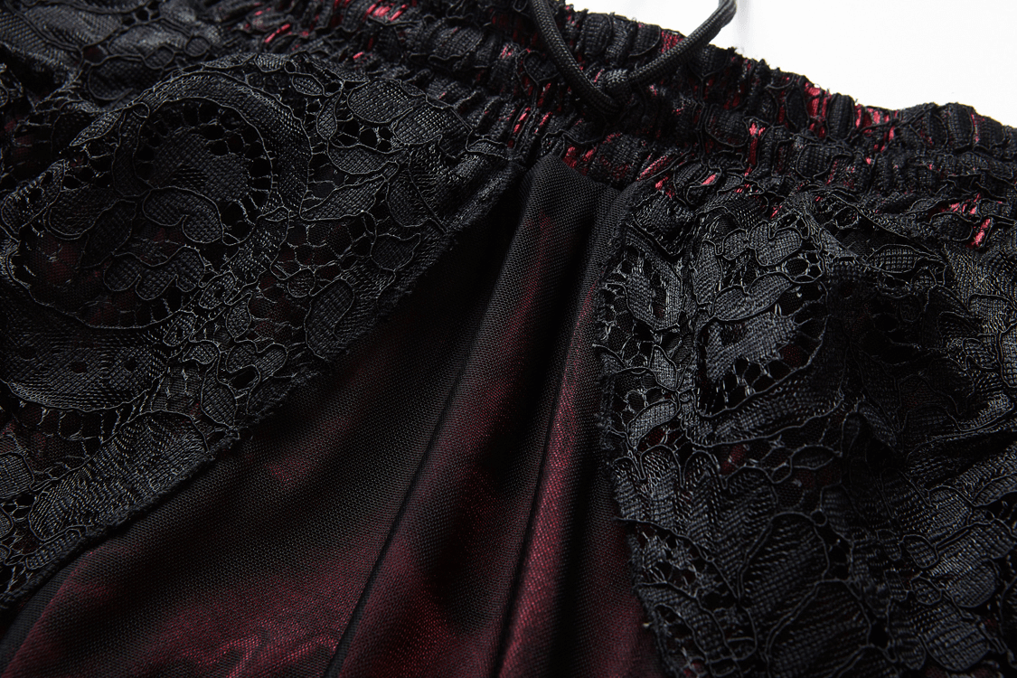 Close-up of black lace fabric with ruffles, showcasing the intricate detailing of a vintage maxi skirt.