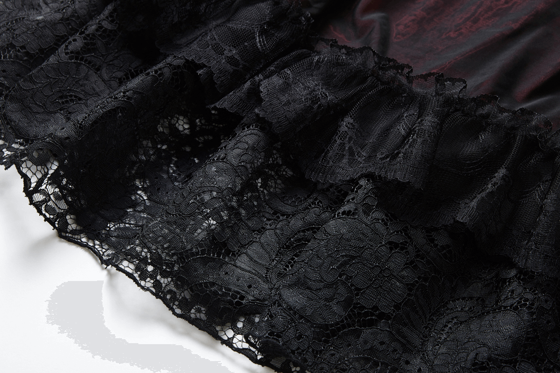 Close-up of black lace fabric with ruffles, showcasing vintage gothic style for a ruffled maxi skirt.
