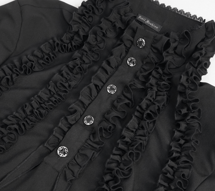 Vintage black shirt featuring frilly long sleeves and decorative buttons for a bold, stylish look.