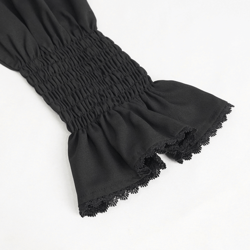 Vintage black shirt sleeve with ruffled cuffs and smocked detail, adding elegant flair to men's fashion.