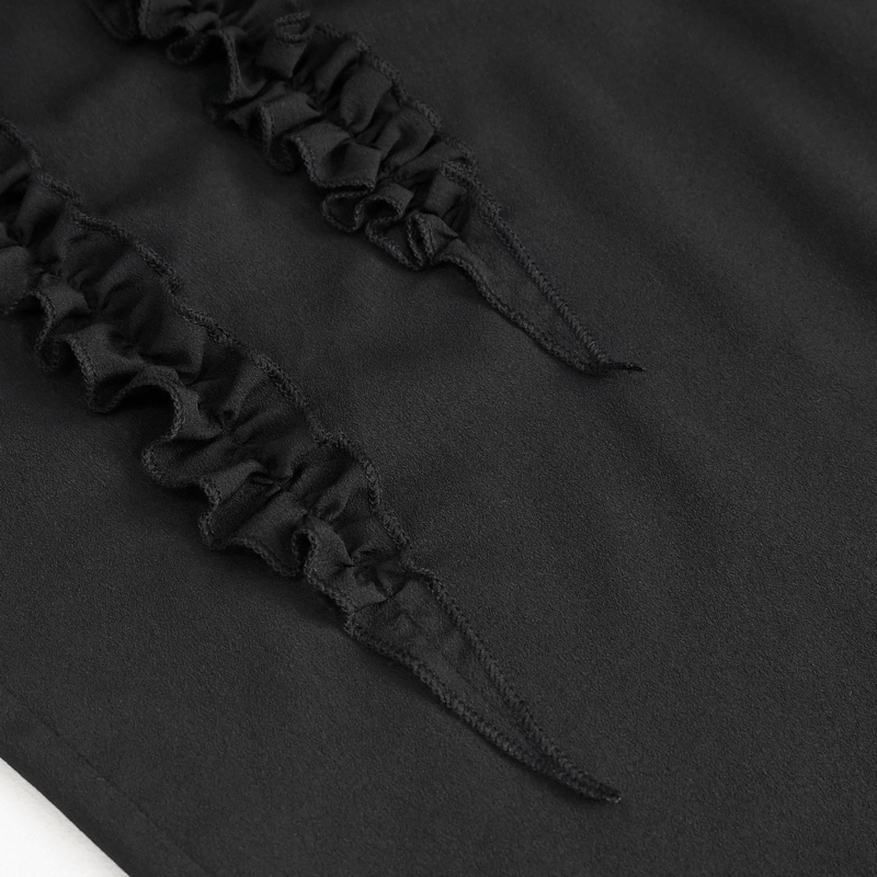 Close-up of elegant ruffled cuffs on a black vintage frilly long sleeves shirt for men.