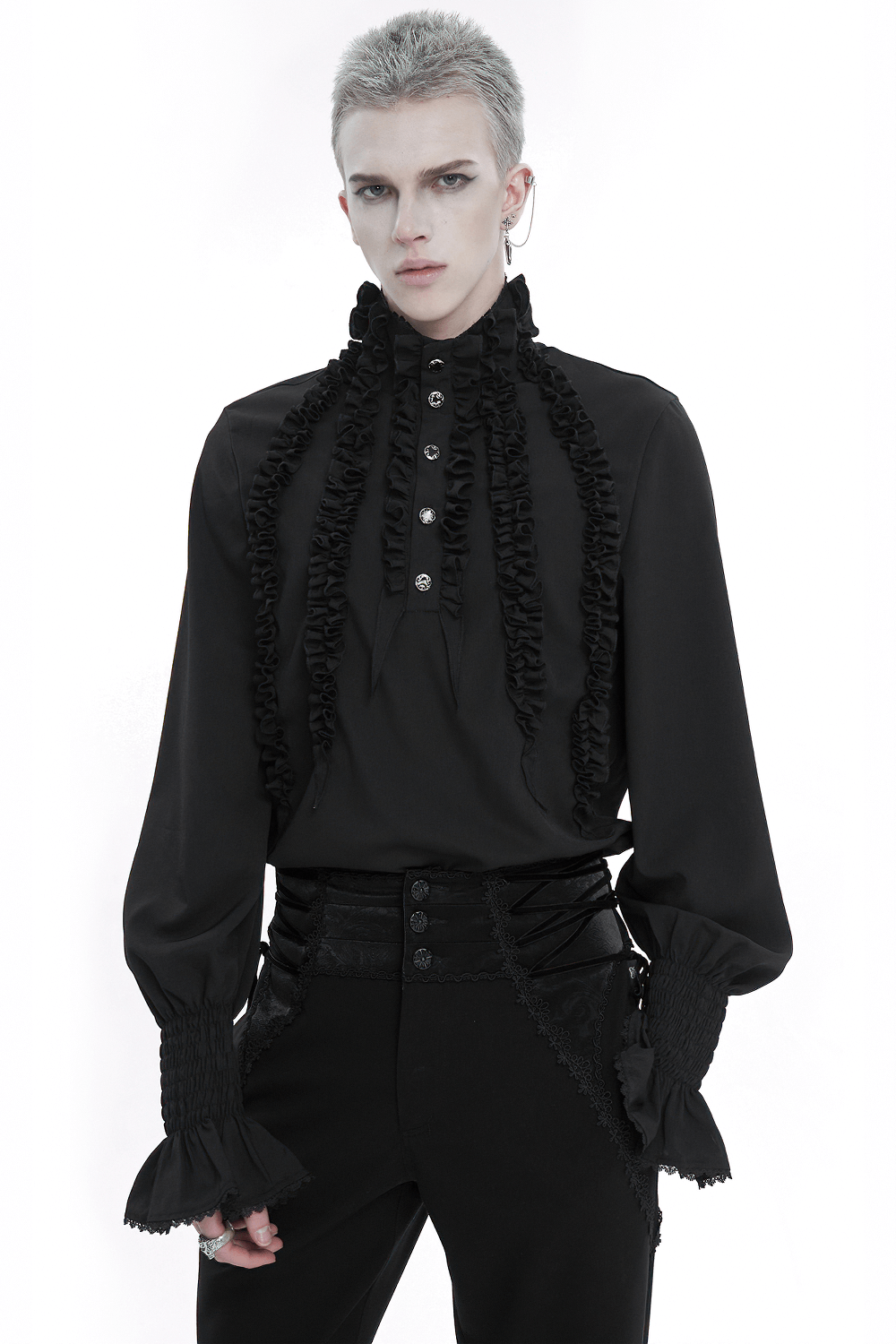Men's vintage black shirt with ruffled cuffs and buttons, combining elegance and bold fashion.
