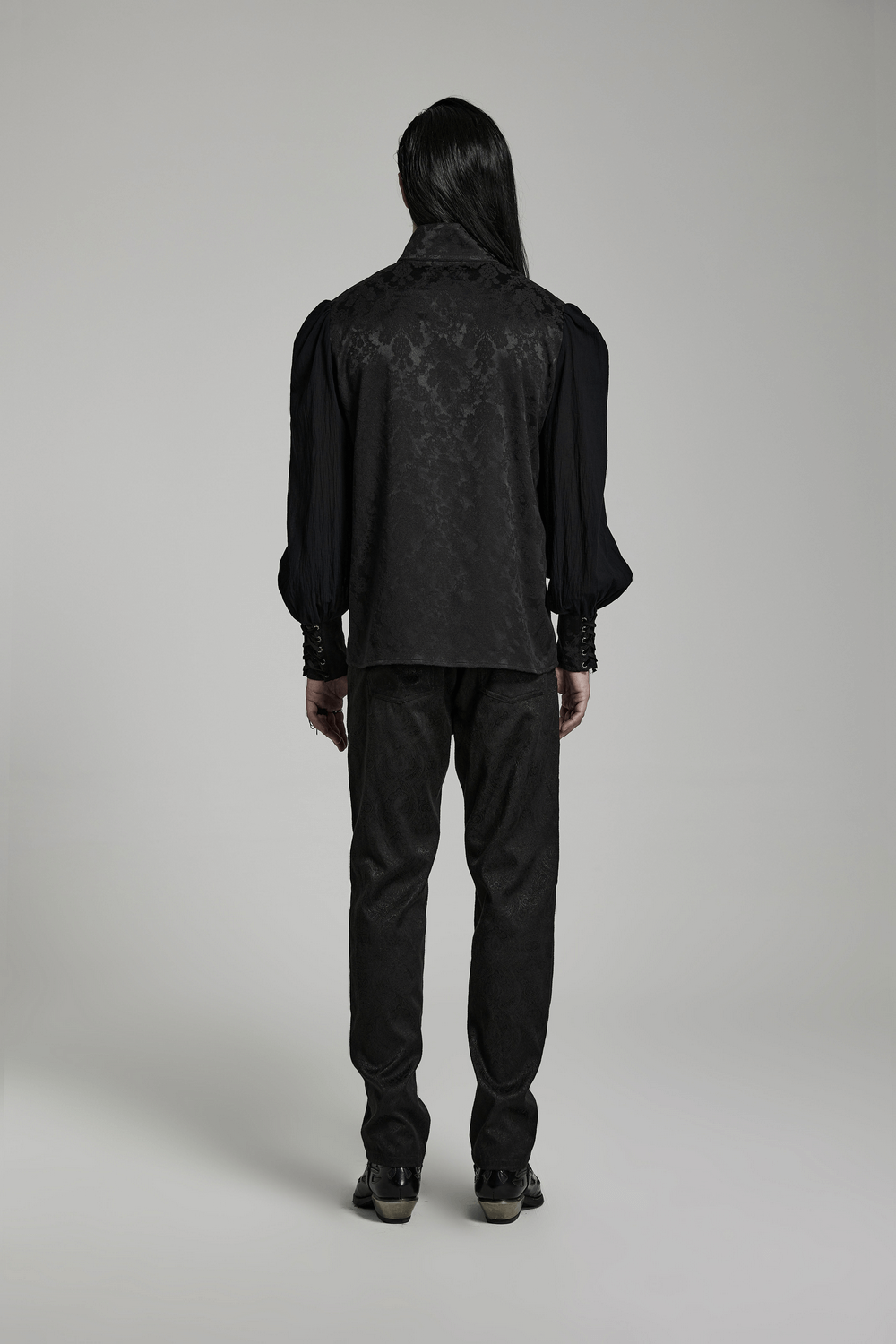 Back view of a vintage gothic button-up jacquard shirt with lantern sleeves and stand collar.