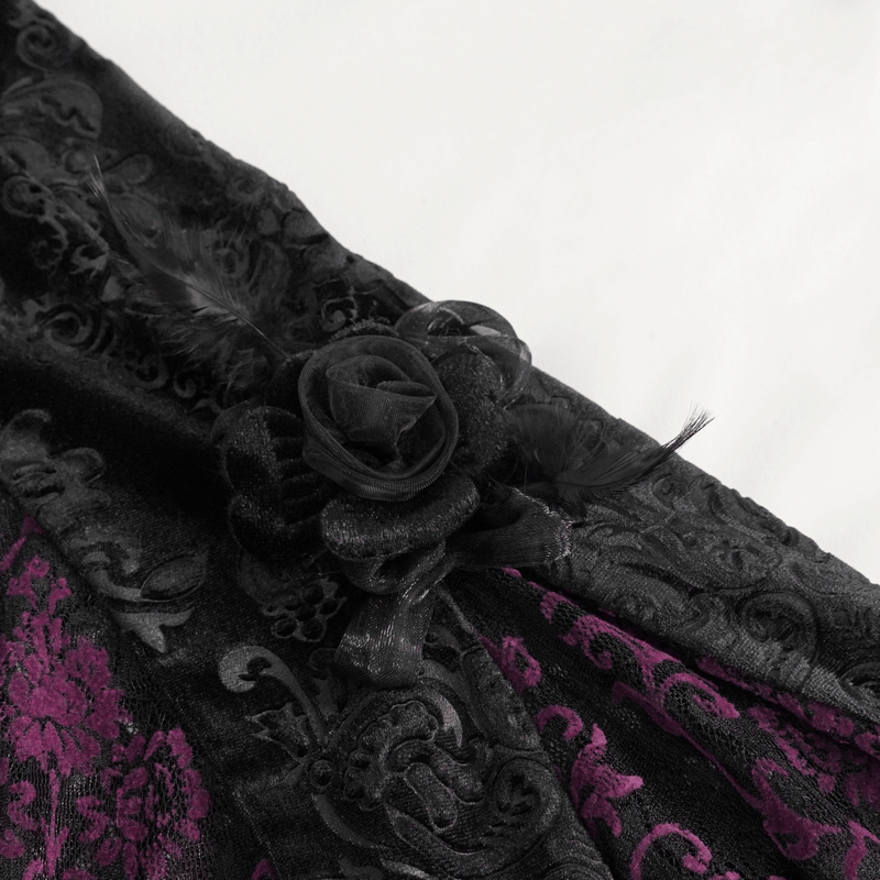 Black velvet fabric with gothic floral pattern and decorative black rose detail.