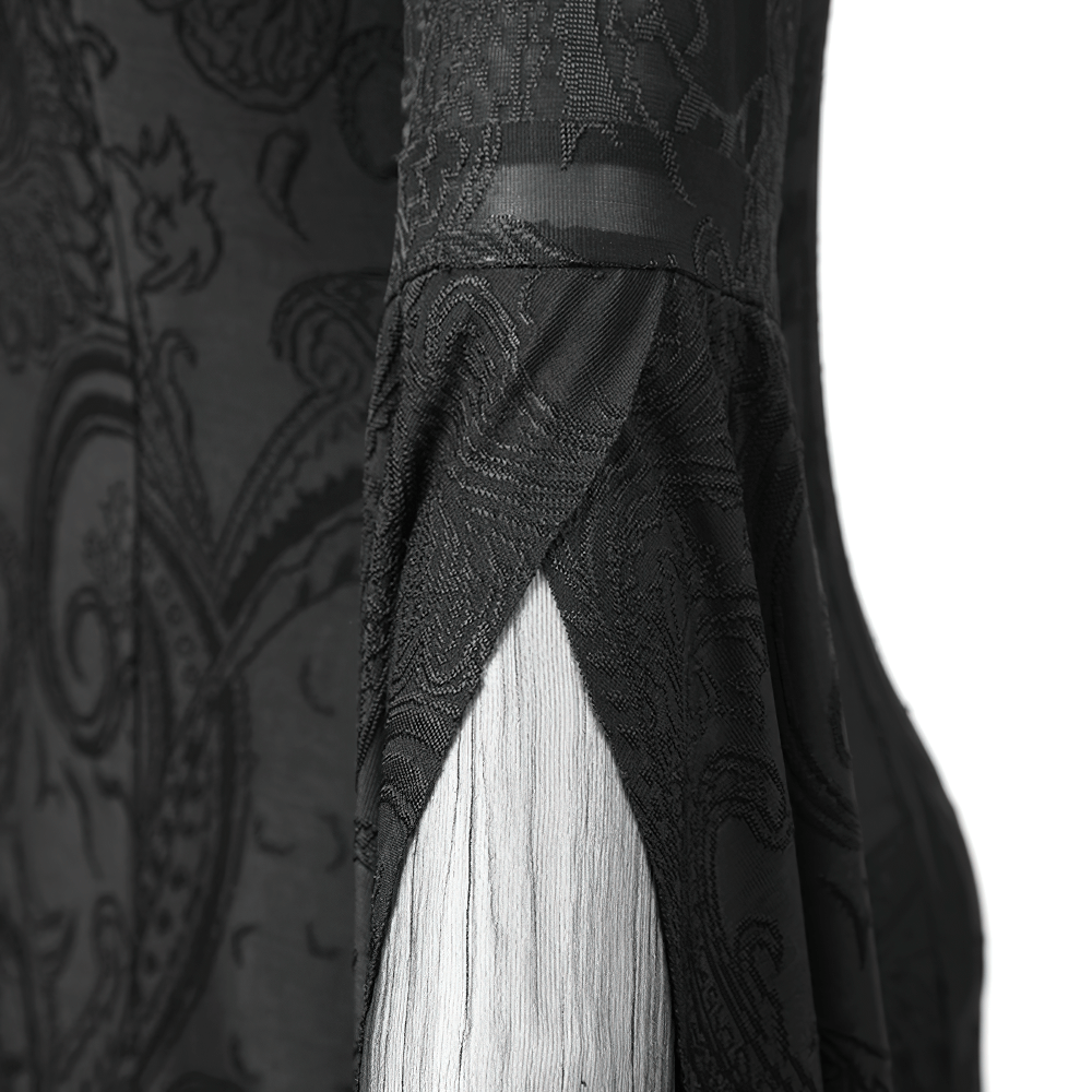Close-up of intricate embroidery on long-sleeved vintage gothic hooded cape for women.