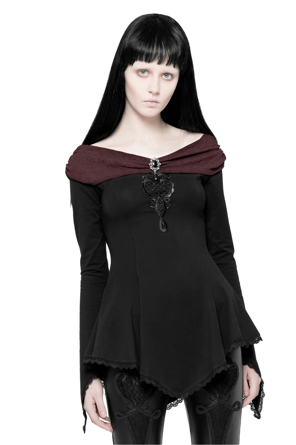 Vintage Gothic long sleeve top with lace trim and brooch, featuring a unique boat neck and horn cuff details.