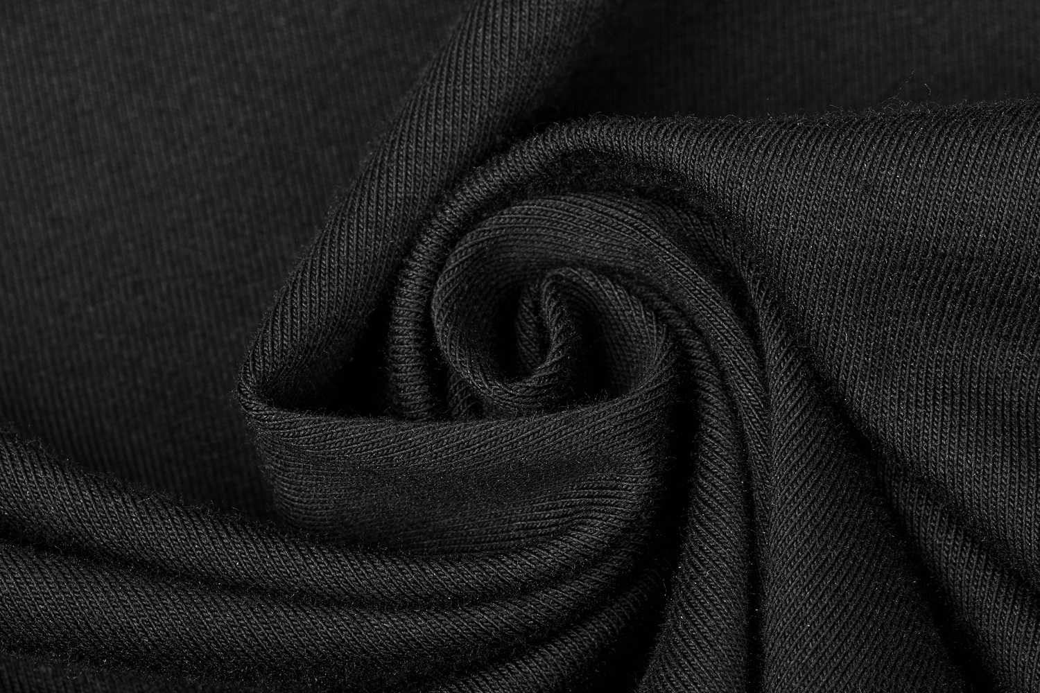 Close-up of soft, stretchy black fabric ideal for vintage Gothic fashion and elegant long sleeve tops.