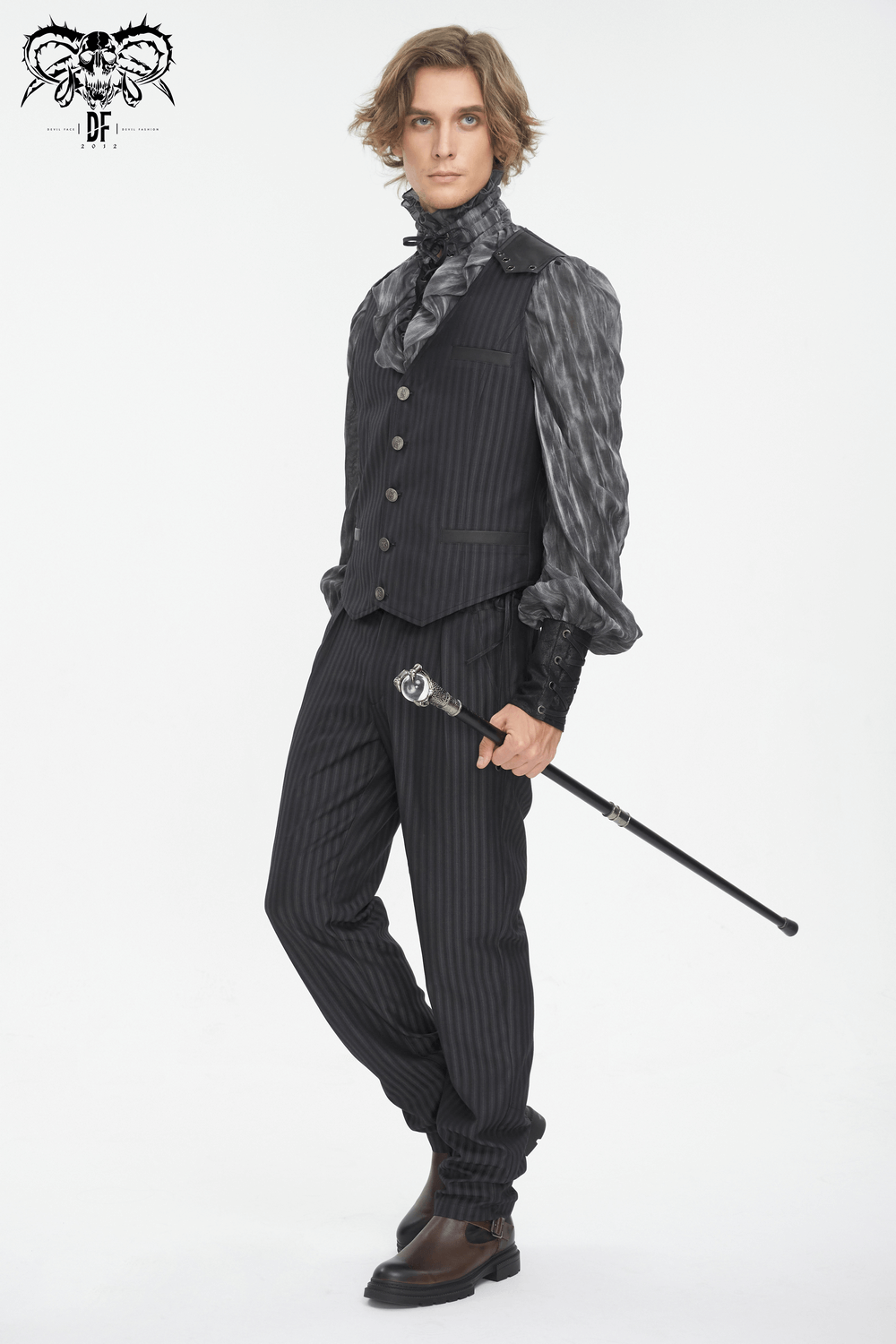 Stylish man in a vintage gothic pinstriped waistcoat with a cane, perfect for formal and casual events.