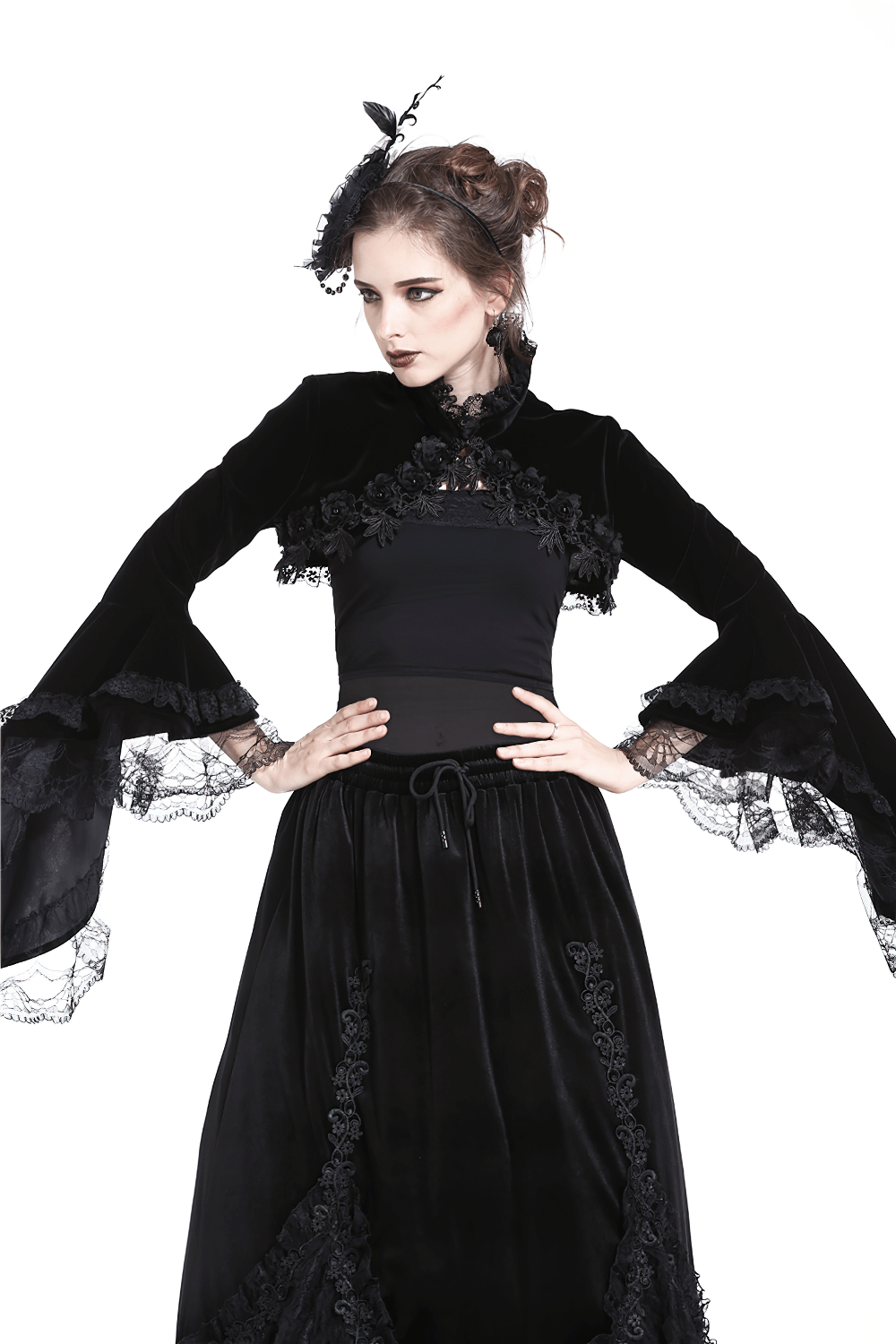 Gothic black velvet bolero with lace sleeves, perfect for a Victorian-inspired look.