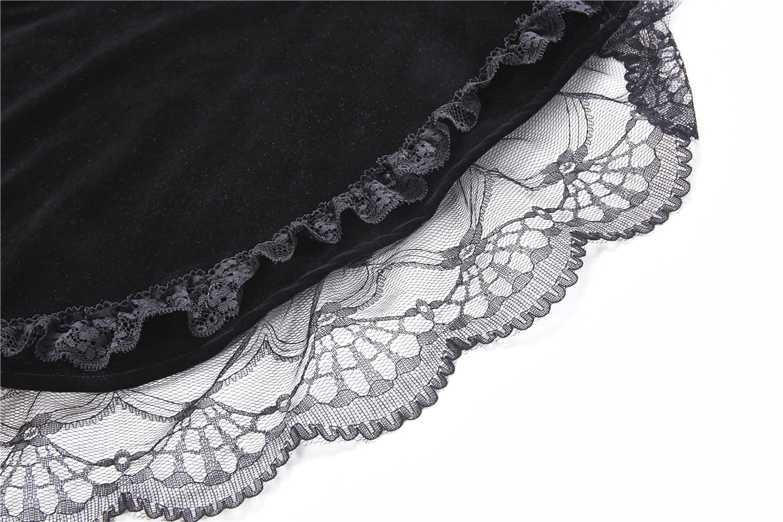 Close-up of black velvet bolero with intricate lace sleeves, showcasing a gothic Victorian style.