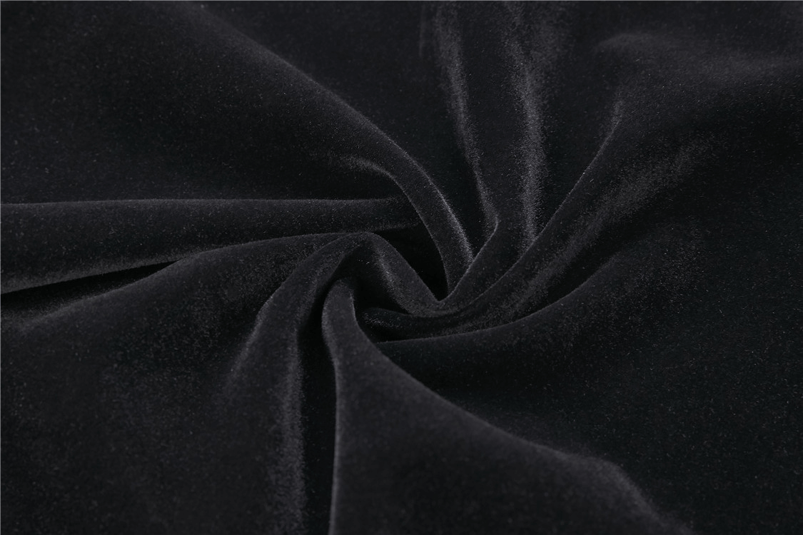 Luxurious black velvet fabric showcasing its smooth texture, perfect for a vintage gothic bolero.