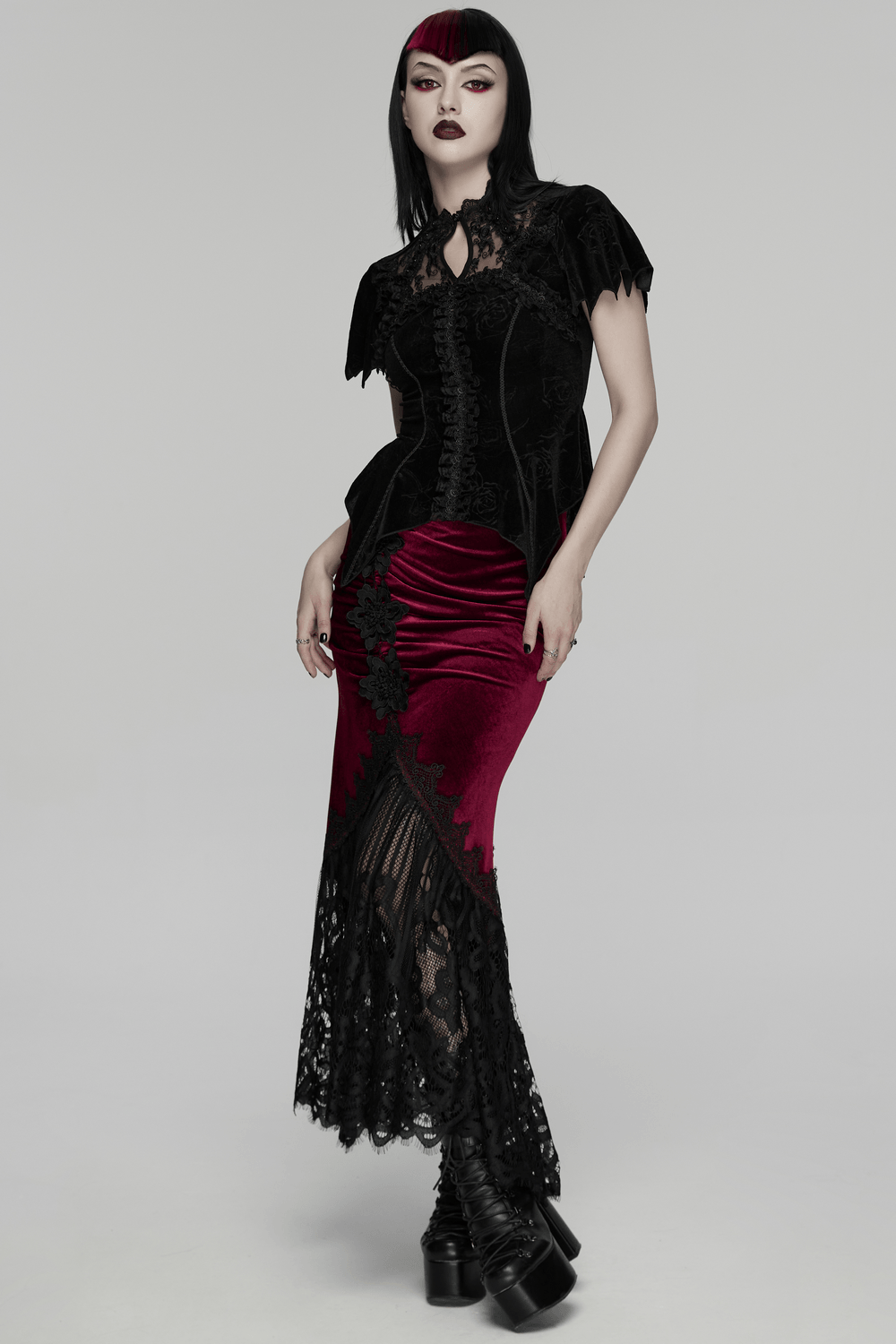Alt Tag: Vintage Gothic Velvet Mermaid Skirt with Lace Hem in burgundy velvet with black lace fishtail hem and ruched panels, worn on model
