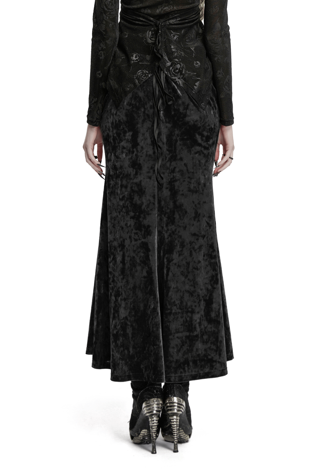 Back view of a vintage gothic velvet skirt with lace details and pleats, styled with unique gothic accessories.