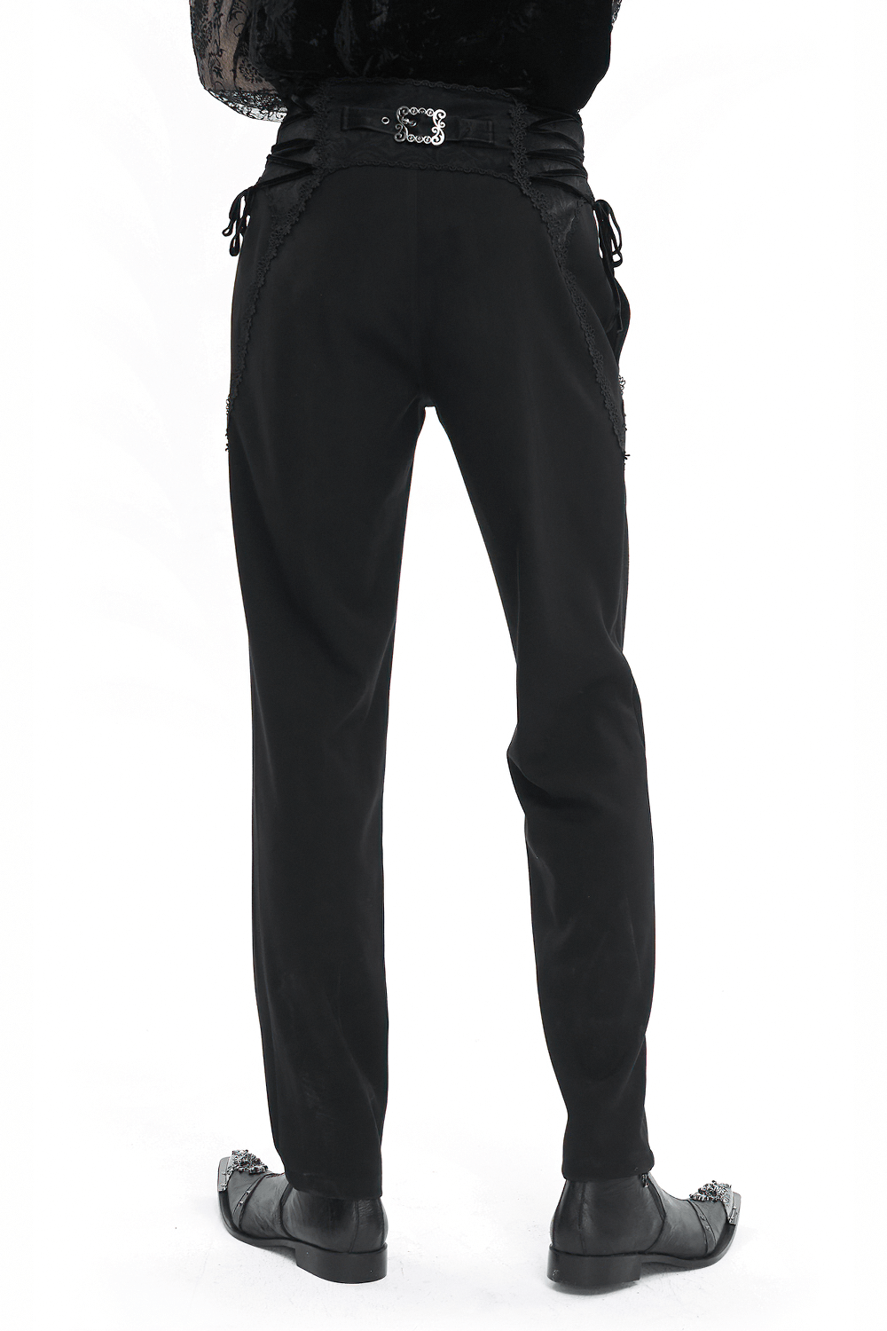 Men's vintage high-waisted gothic pants with lace-up waist and patterned buttons, showcasing a bold style.
