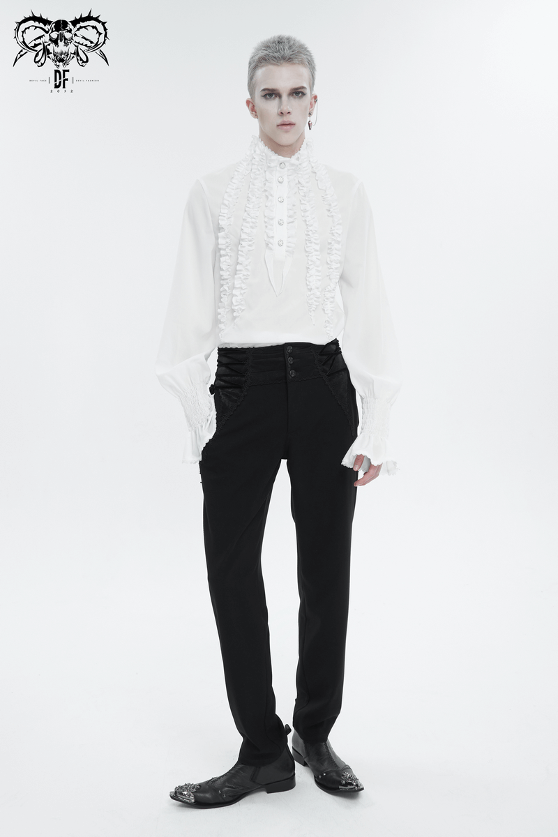 Stylish model showcasing vintage high-waisted gothic trousers and intricate ruffled white shirt.