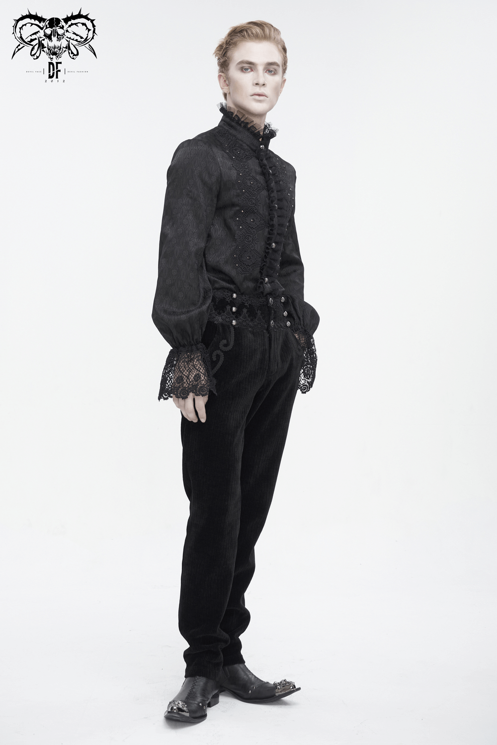 Vintage-inspired black corduroy pants with lace detail, styled elegantly on a model.