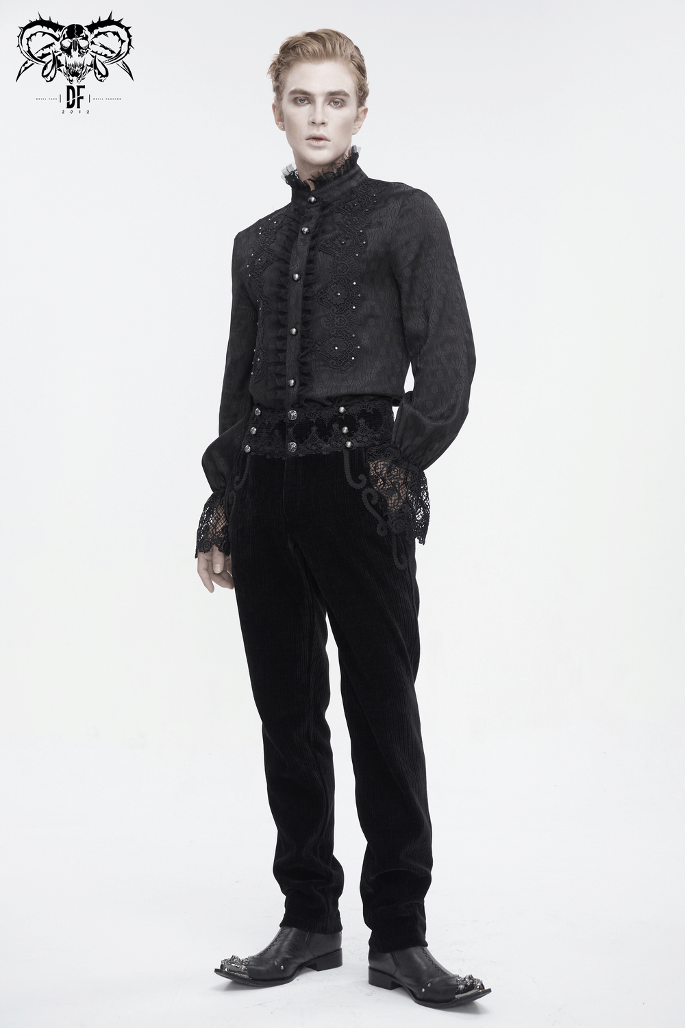 Model wearing vintage-inspired black corduroy pants with lace detail, styled for a modern yet classic look.