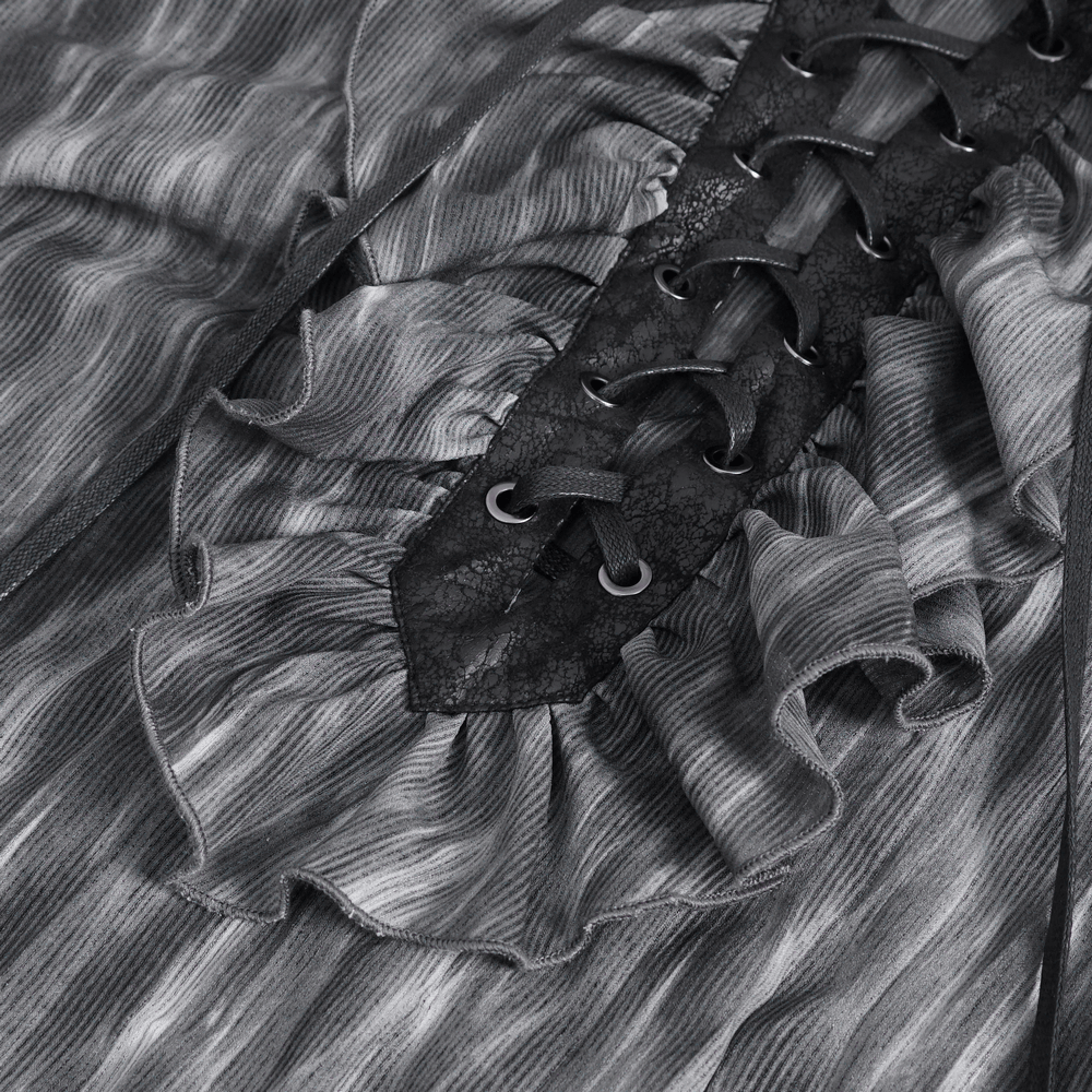 Close-up of vintage-inspired lace-up ruffle gothic shirt showcasing textured fabric and intricate detailing.