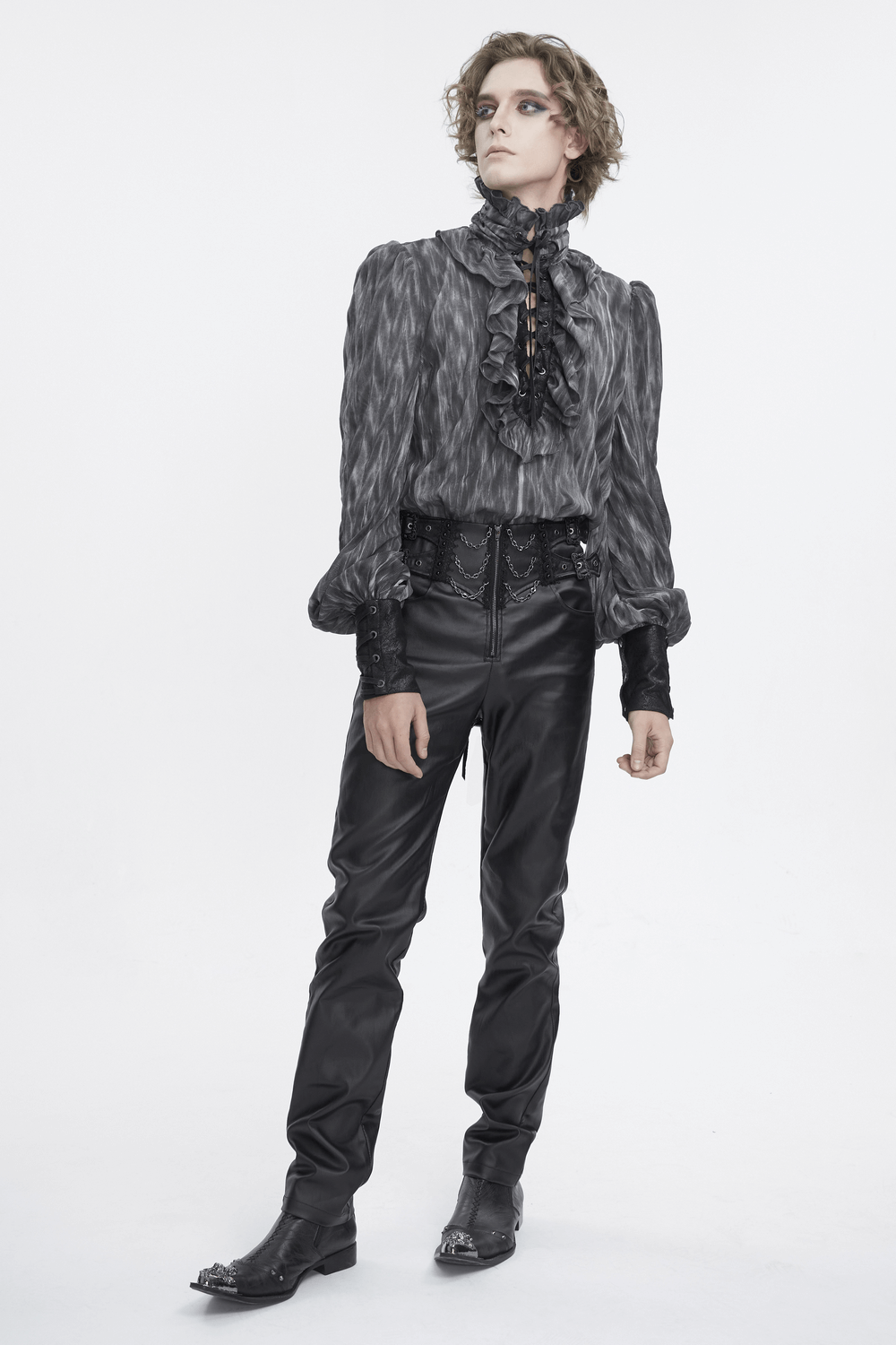 Men's vintage-inspired lace-up gothic shirt with ruffles, paired with stylish black pants and boots.