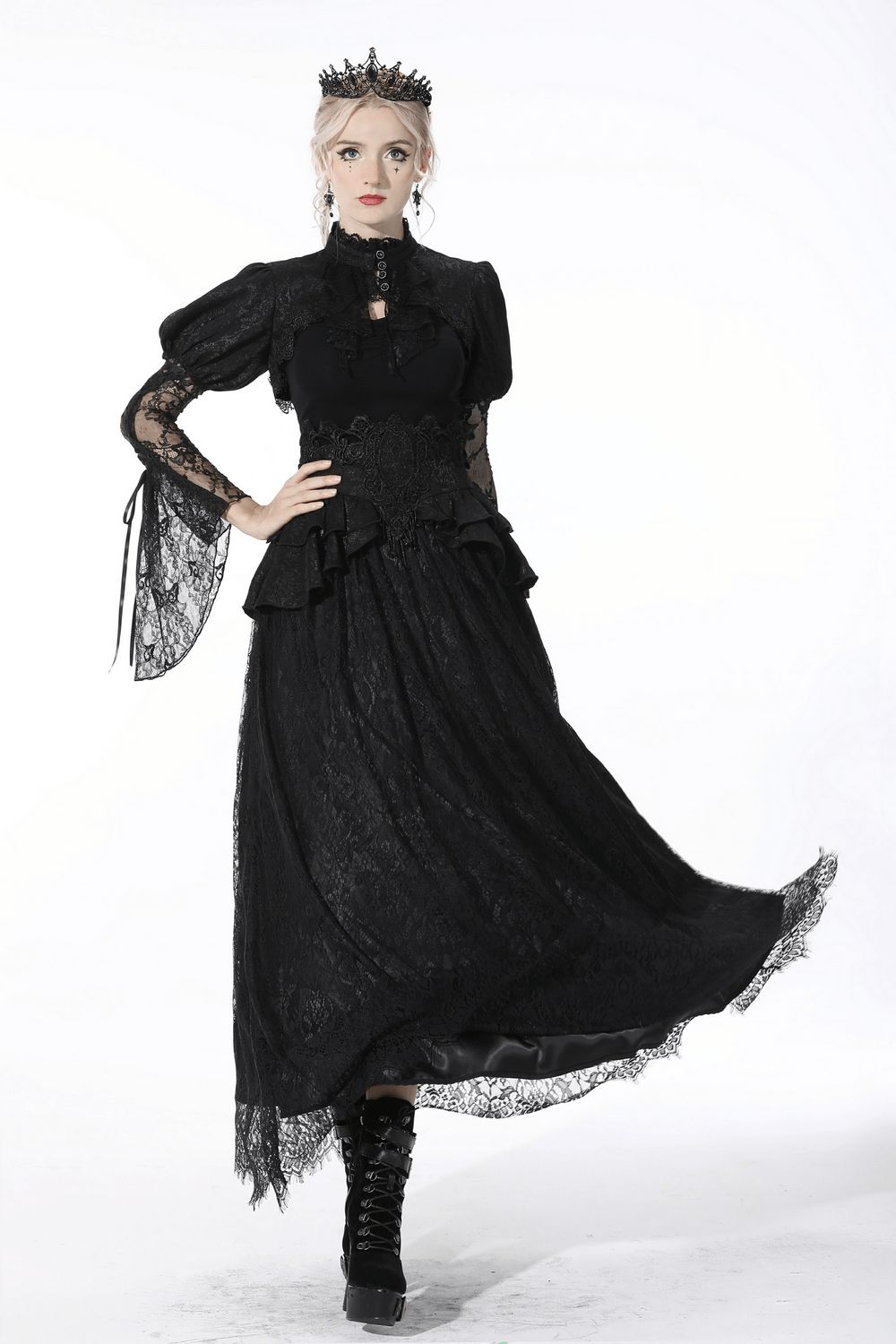 Victorian-inspired black lace skirt with ruffles and satin ribbon, styled for gothic fashion.