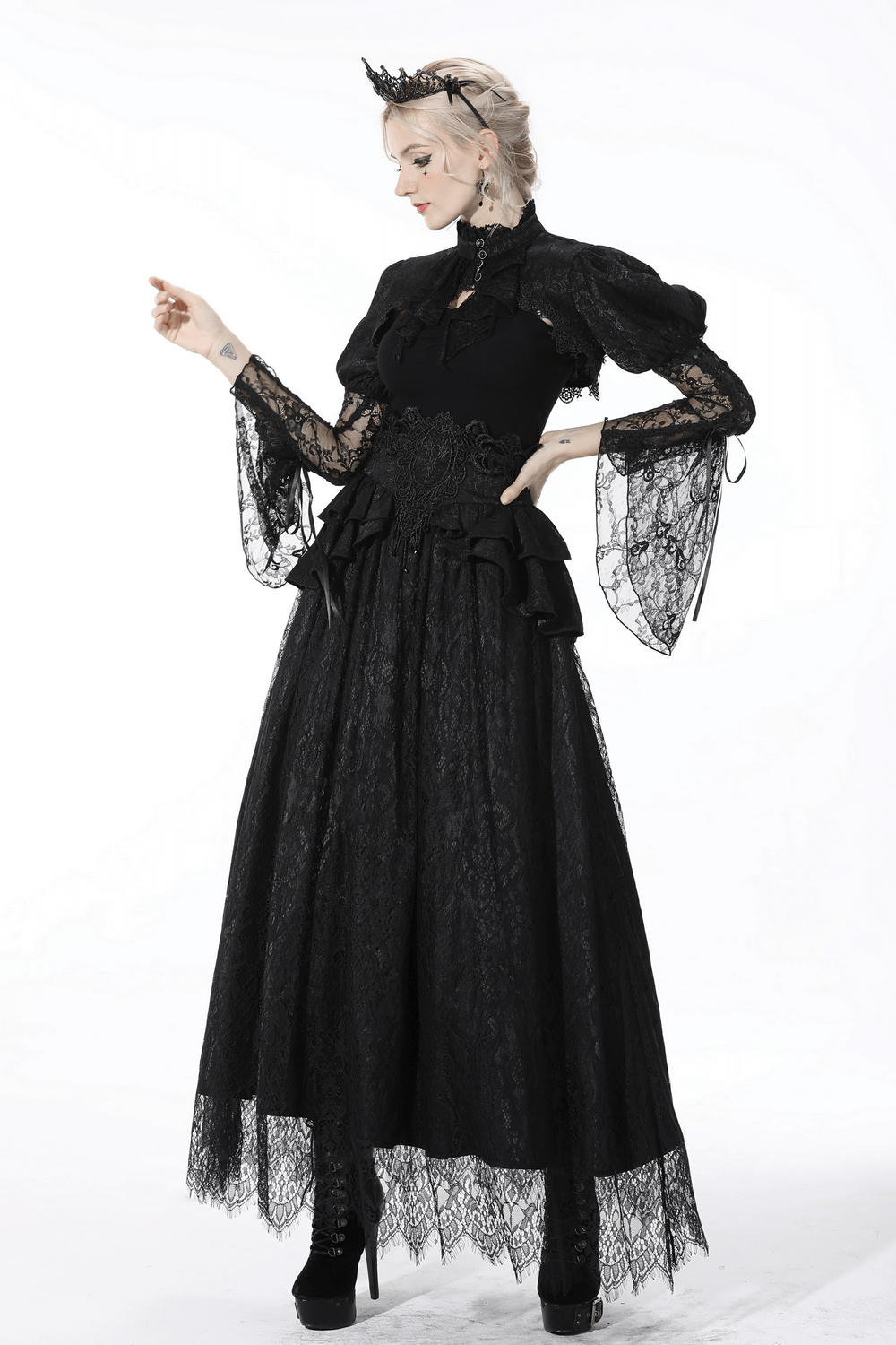 Victorian-inspired black lace skirt with ruffles and satin ribbon, perfect for gothic or steampunk outfits.