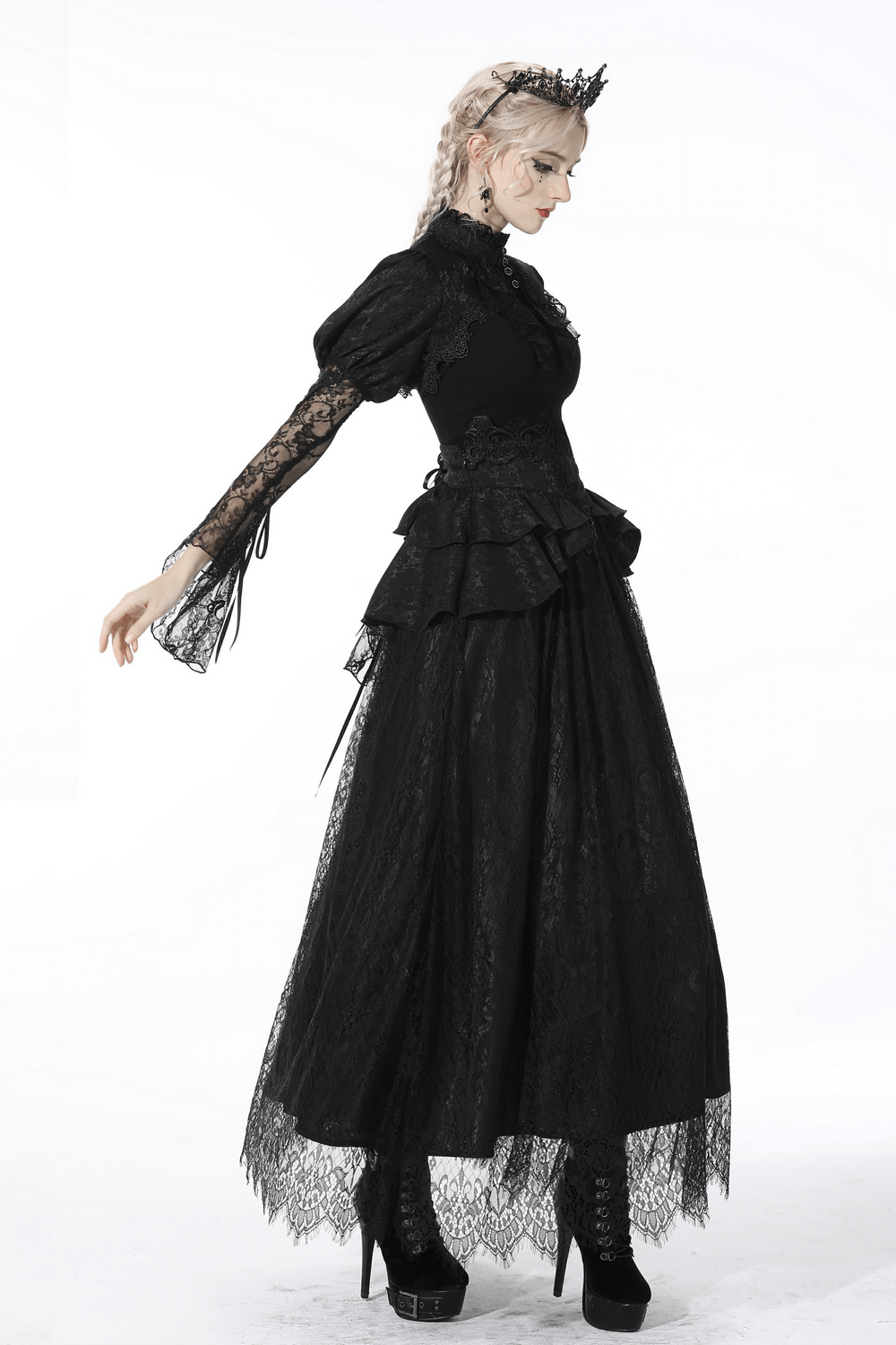 Victorian-inspired black lace skirt with ruffles and satin ribbon, perfect for gothic and steampunk outfits.