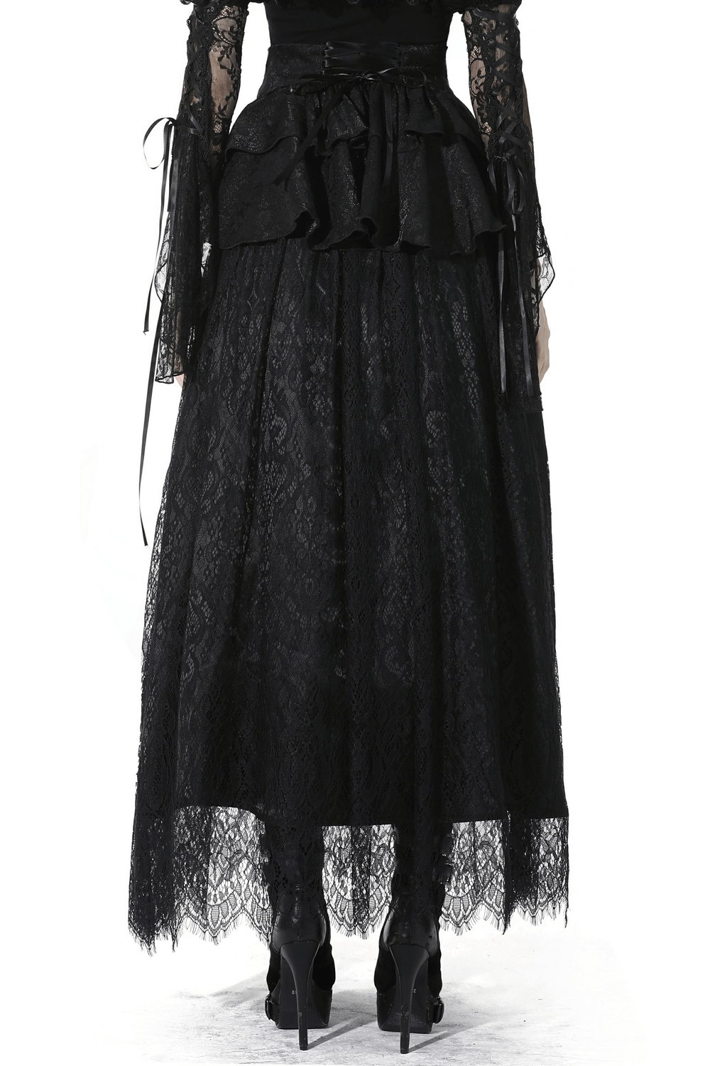 Back view of vintage black lace skirt with ruffles and satin ribbon, perfect for gothic and Victorian-inspired outfits.
