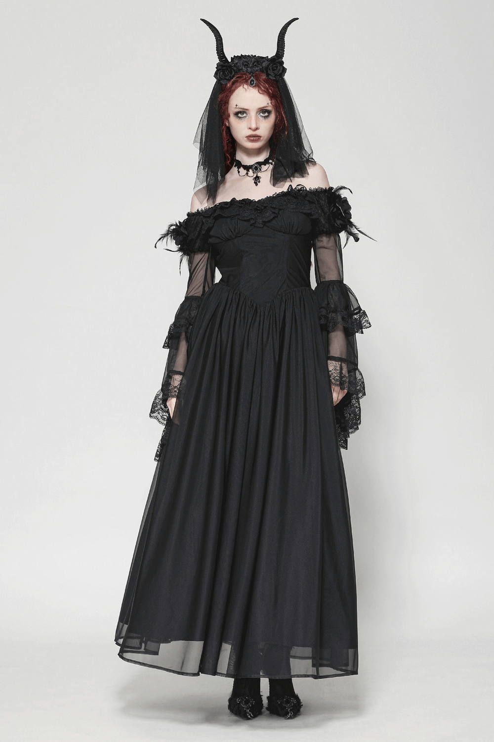 Vintage Gothic dress with lace sleeves and feather accents, perfect for themed events or elegant evening wear.