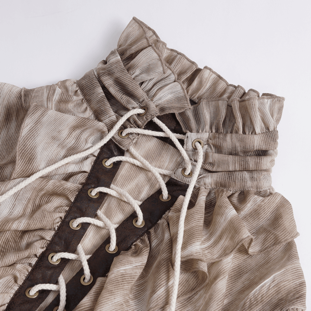 Close-up of a vintage lace-up Gothic shirt with ruffled neck and intricate detailing, perfect for Victorian style.