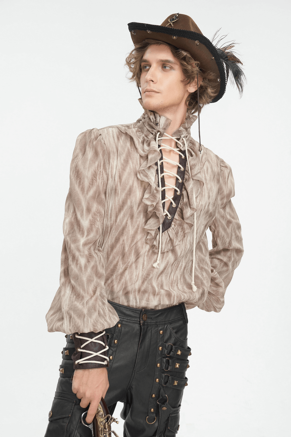 Vintage lace-up Gothic shirt with ruffled neck and full sleeves, styled with a hat for a dramatic Victorian look.