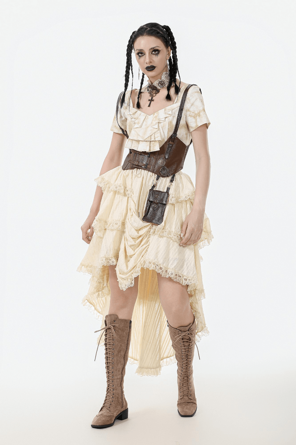 Model in a vintage high-low boho skirt with lace trim and stylish accessories, perfect for festival vibes.