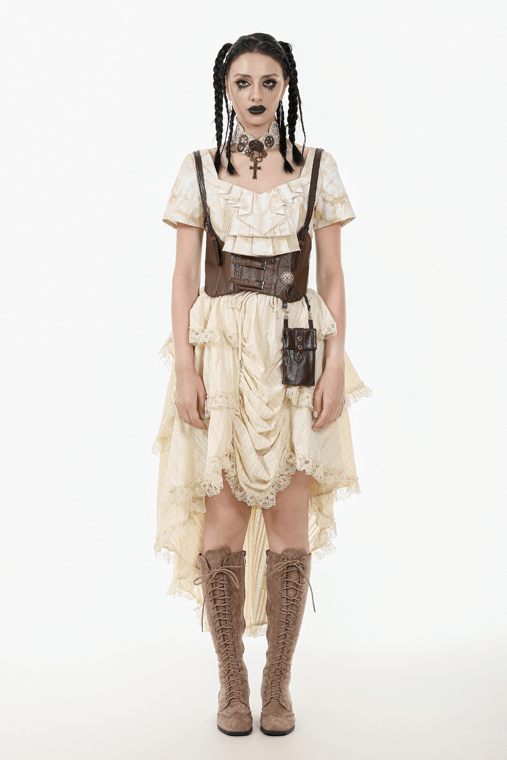 Model in vintage high-low boho skirt with lace trim, black accessories, and gothic makeup for a festival look.