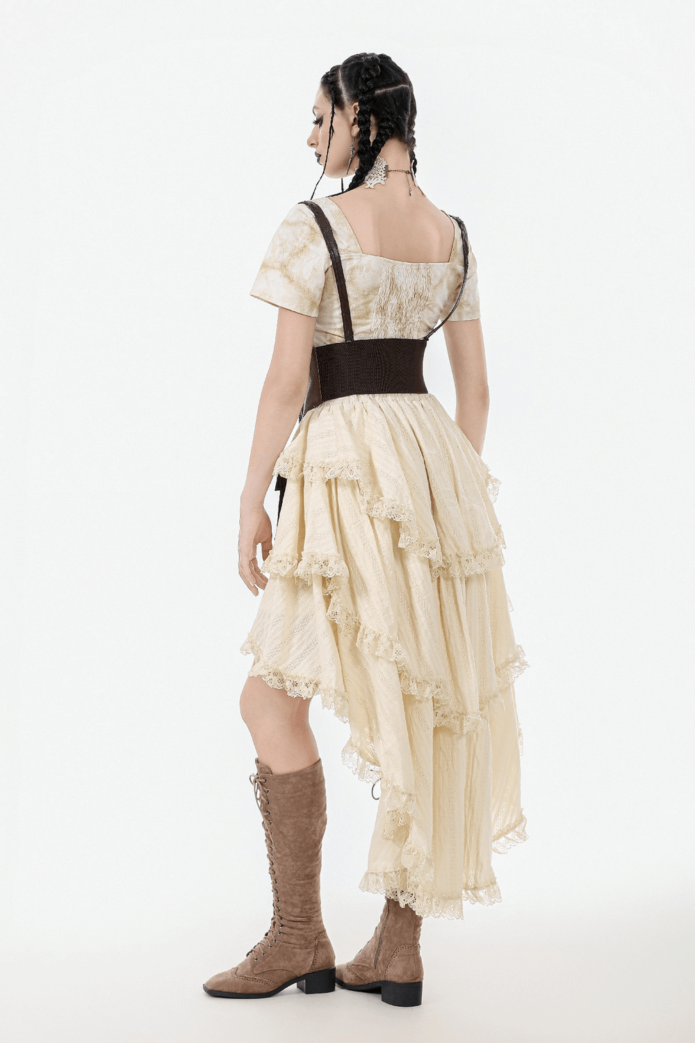 Back view of a vintage layered ruffle high-low boho skirt with lace trim, perfect for festival fashion.