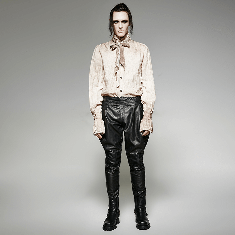 Model showcasing a vintage linen retro tie shirt paired with leather pants, embodying a steampunk-inspired aesthetic.