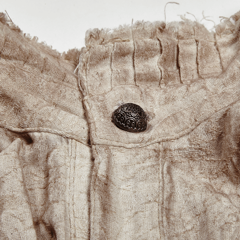Close-up of vintage linen shirt collar with decorative button, showcasing steampunk inspired retro fashion.