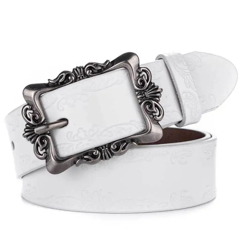 Stylish vintage women's white leather belt with ornate silver buckle, perfect for adding flair to any outfit.