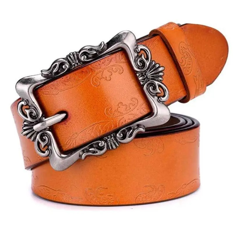 Vintage luxury women's genuine leather belt in orange with ornate silver buckle, perfect fashion accessory for jeans.