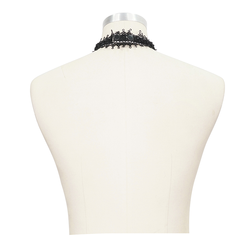 Chic black lace choker on a dress form, perfect for adding vintage elegance to any outfit.