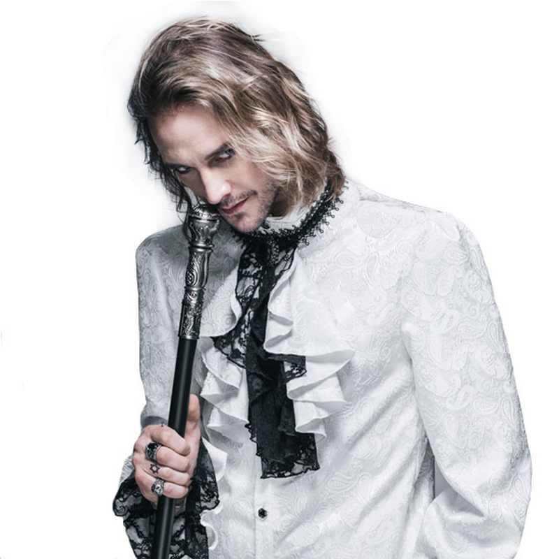 Vintage male model showcasing an elegant black and white frilly tie, styled with a dramatic white shirt.