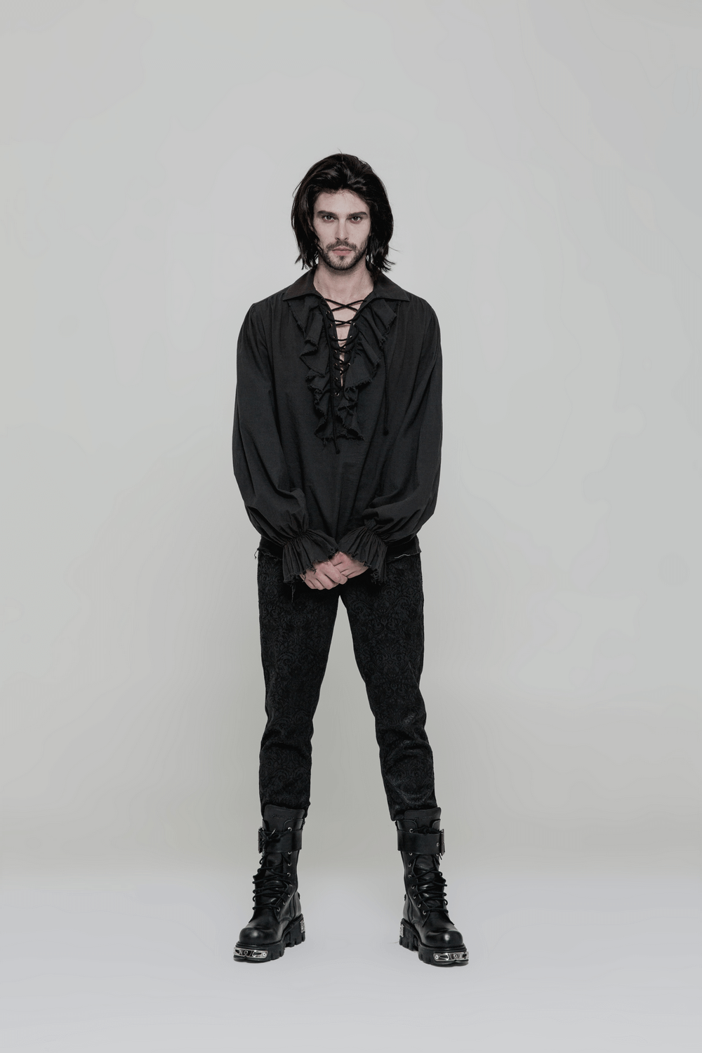 Vintage men's Gothic shirt with ruffle front, black, paired with steampunk-style pants and boots.