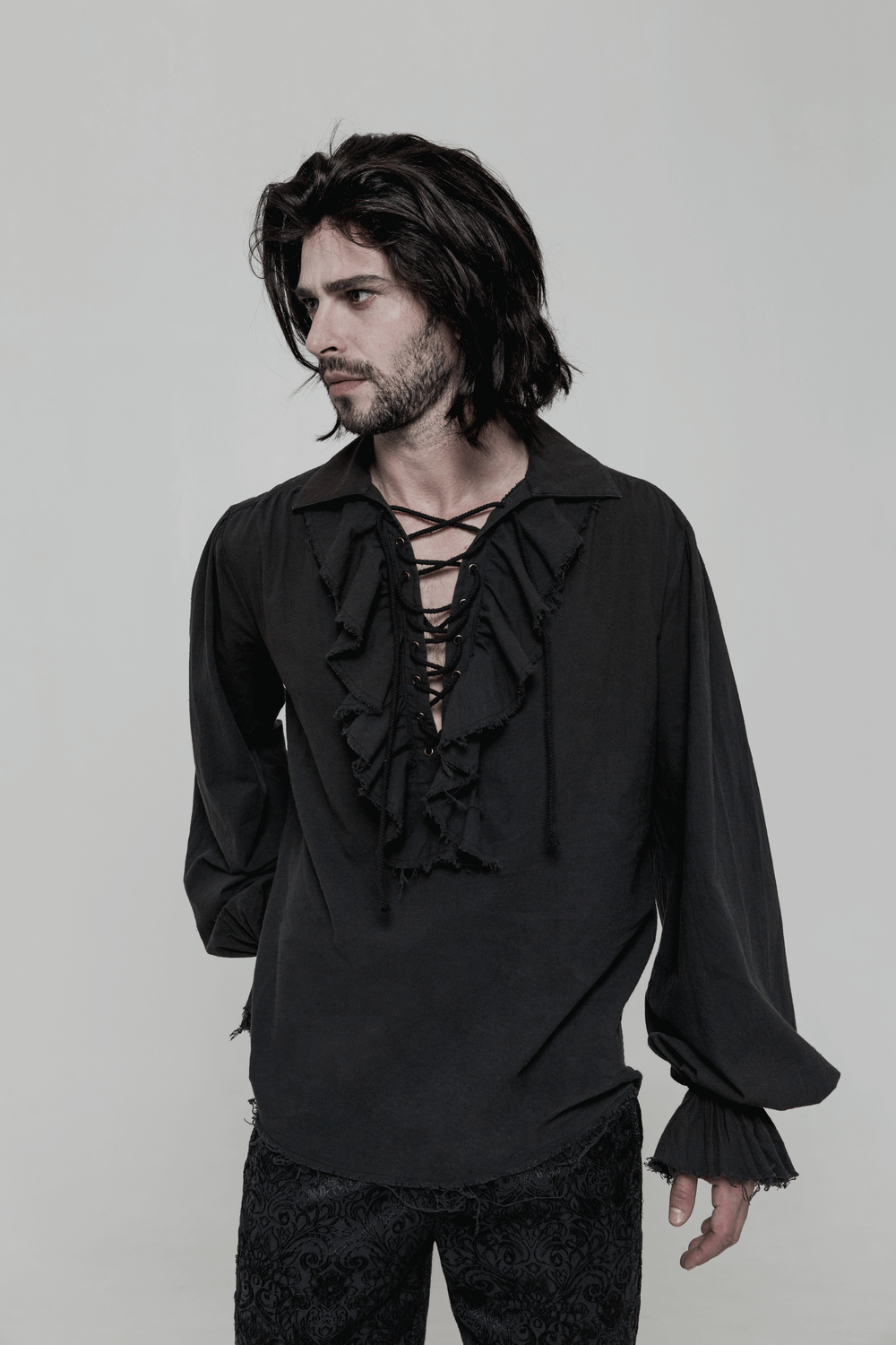 Vintage men's long sleeve gothic shirt with ruffles and lace-up detail, perfect for a steampunk wardrobe.