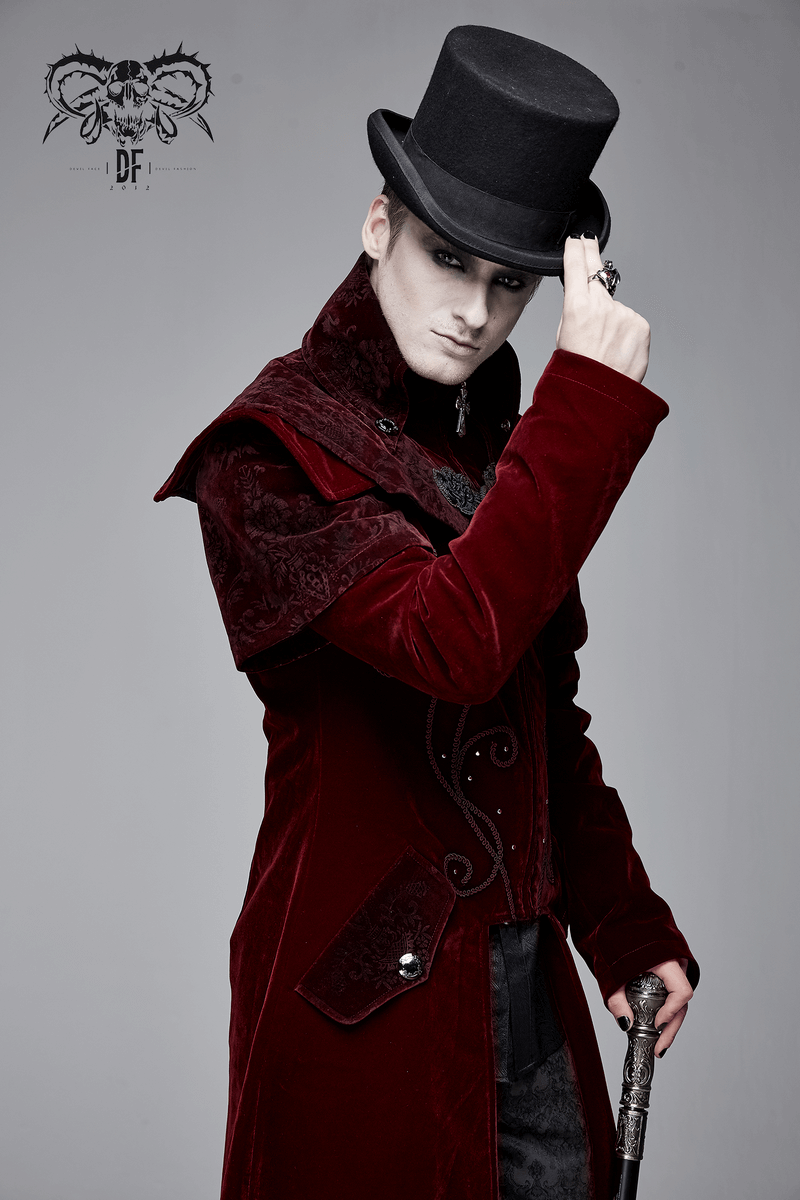 Stylish model wearing a vintage men’s wine red velvet coat with a top hat, showcasing gothic fashion elegance.