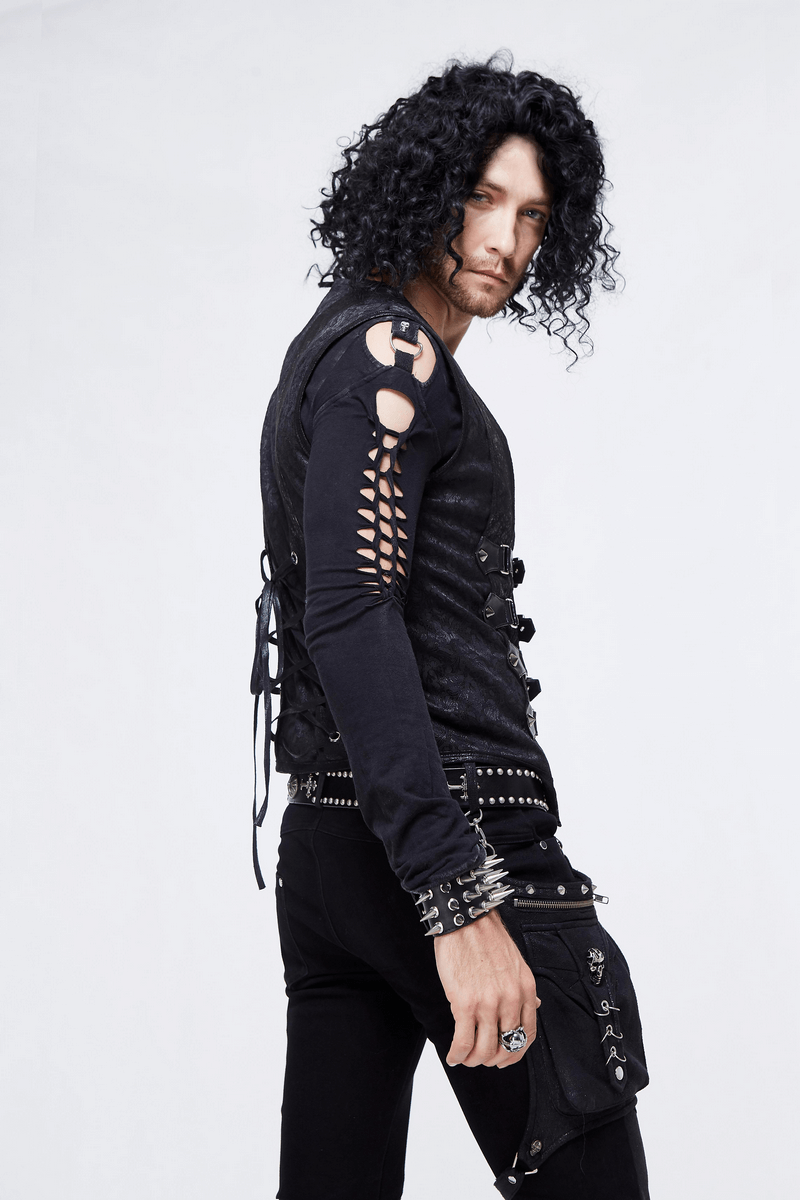 Stylish man in vintage punk waistcoat with buckles and lace-up detail, showcasing a bold punk fashion statement.