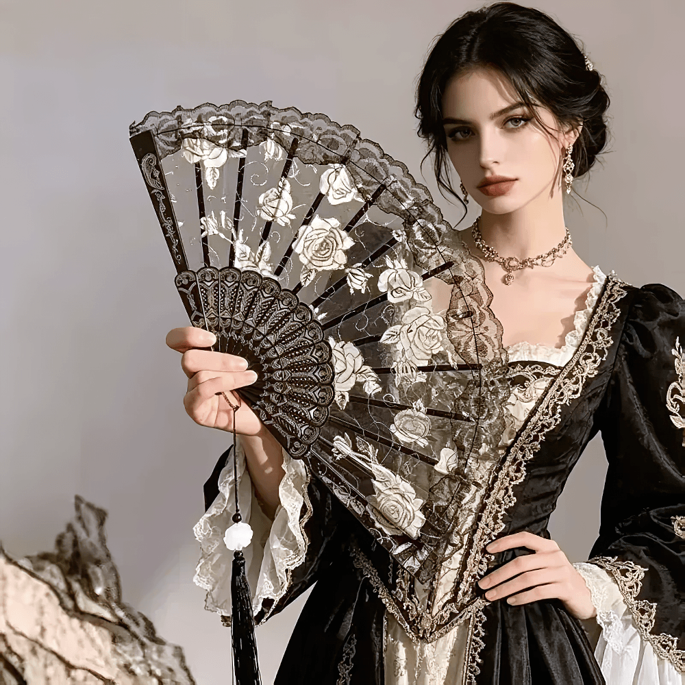 Vintage Rose Lace Folding Fan with Tassel Pendant in black, featuring intricate lace and a charming tassel, perfect for gothic elegance.